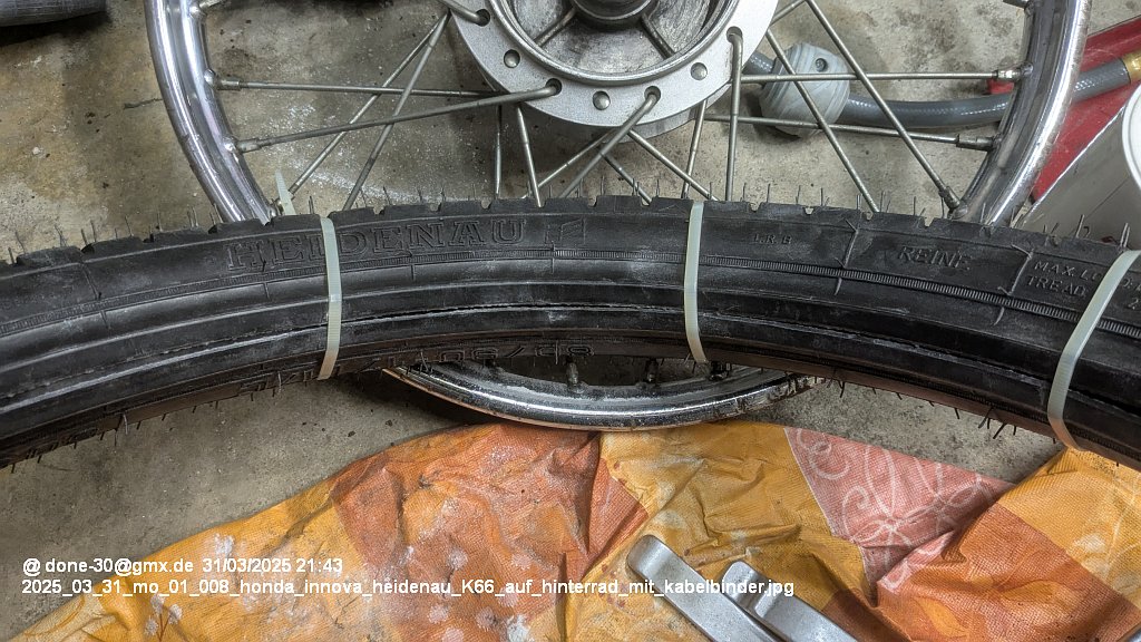 2025_03_31_mo_01_008_honda_innova_heidenau_K66_auf_hinterrad_mit_kabelbinder.jpg