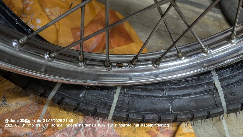 2025_03_31_mo_01_011_honda_innova_heidenau_K66_auf_hinterrad_mit_kabelbinder.jpg