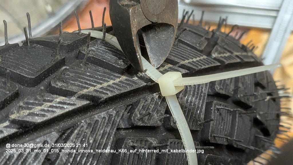 2025_03_31_mo_01_015_honda_innova_heidenau_K66_auf_hinterrad_mit_kabelbinder.jpg
