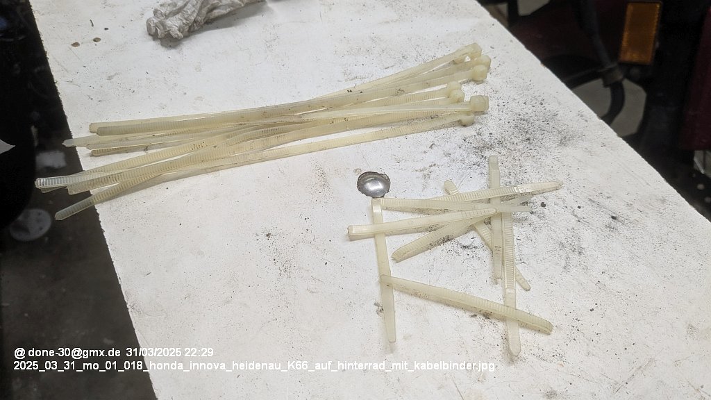 2025_03_31_mo_01_018_honda_innova_heidenau_K66_auf_hinterrad_mit_kabelbinder.jpg
